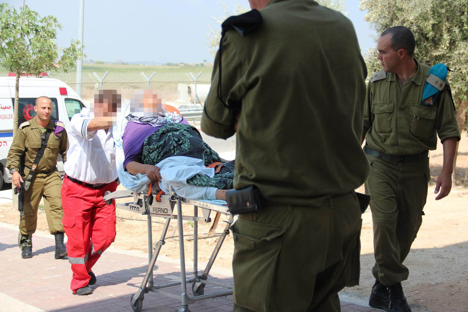 Israel and the Gaza Strip: Why Economic Sanctions Are Not Collective Punishment The IDF Medical Corps treating injured Palestinian civilians at the Erez Border Crossing. (IDF Flicker)