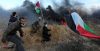 Hamas operatives at the border fence with Israel